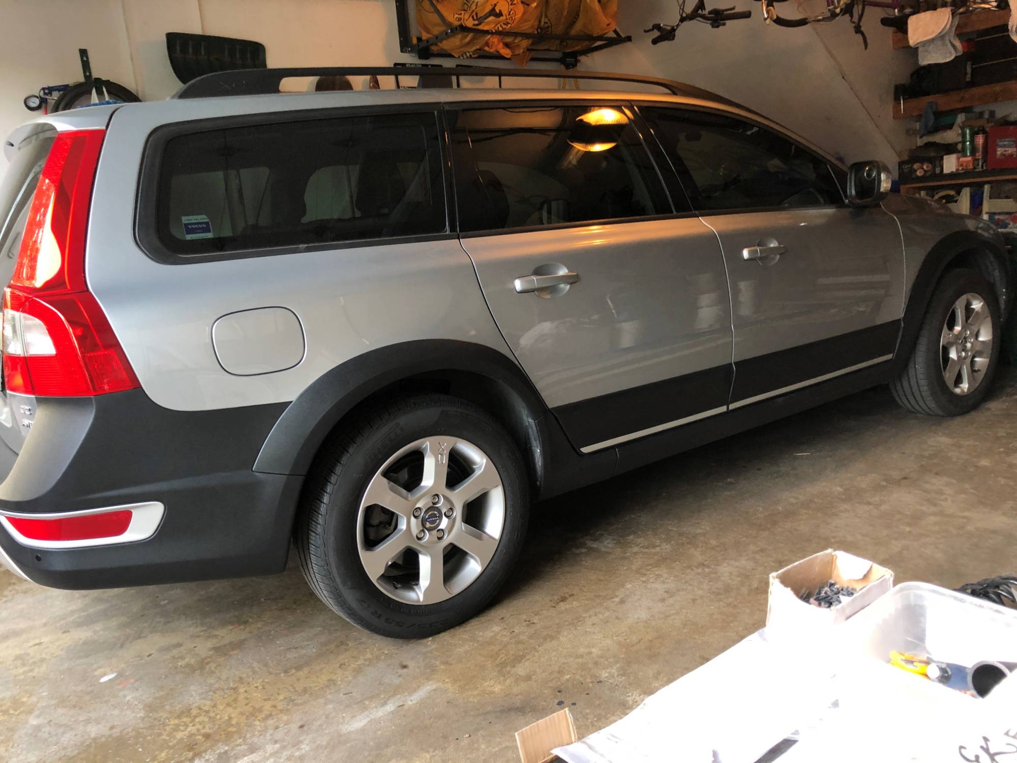 side view of the car with aftermarket spring installed