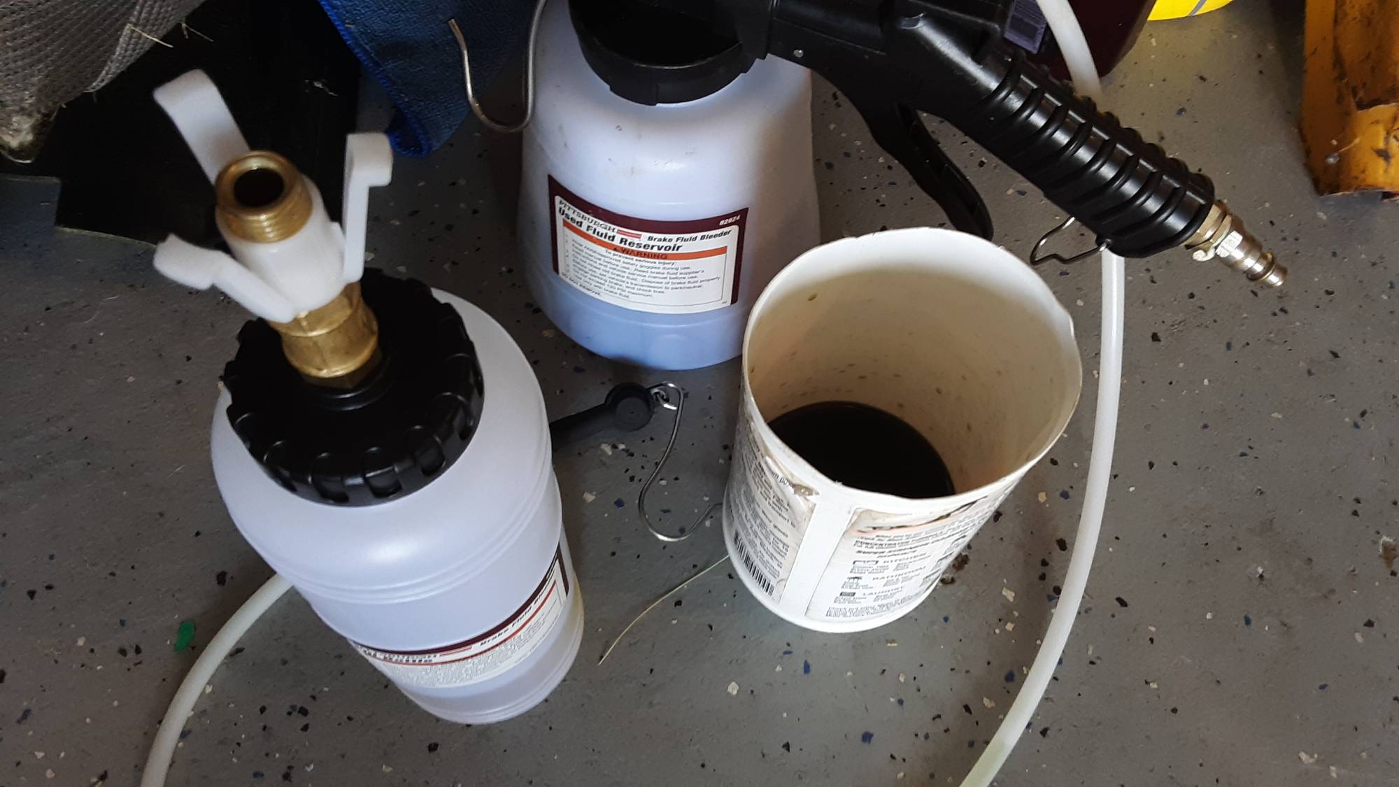 Dark green fluid is what my syringe pulled out of the reservoir.