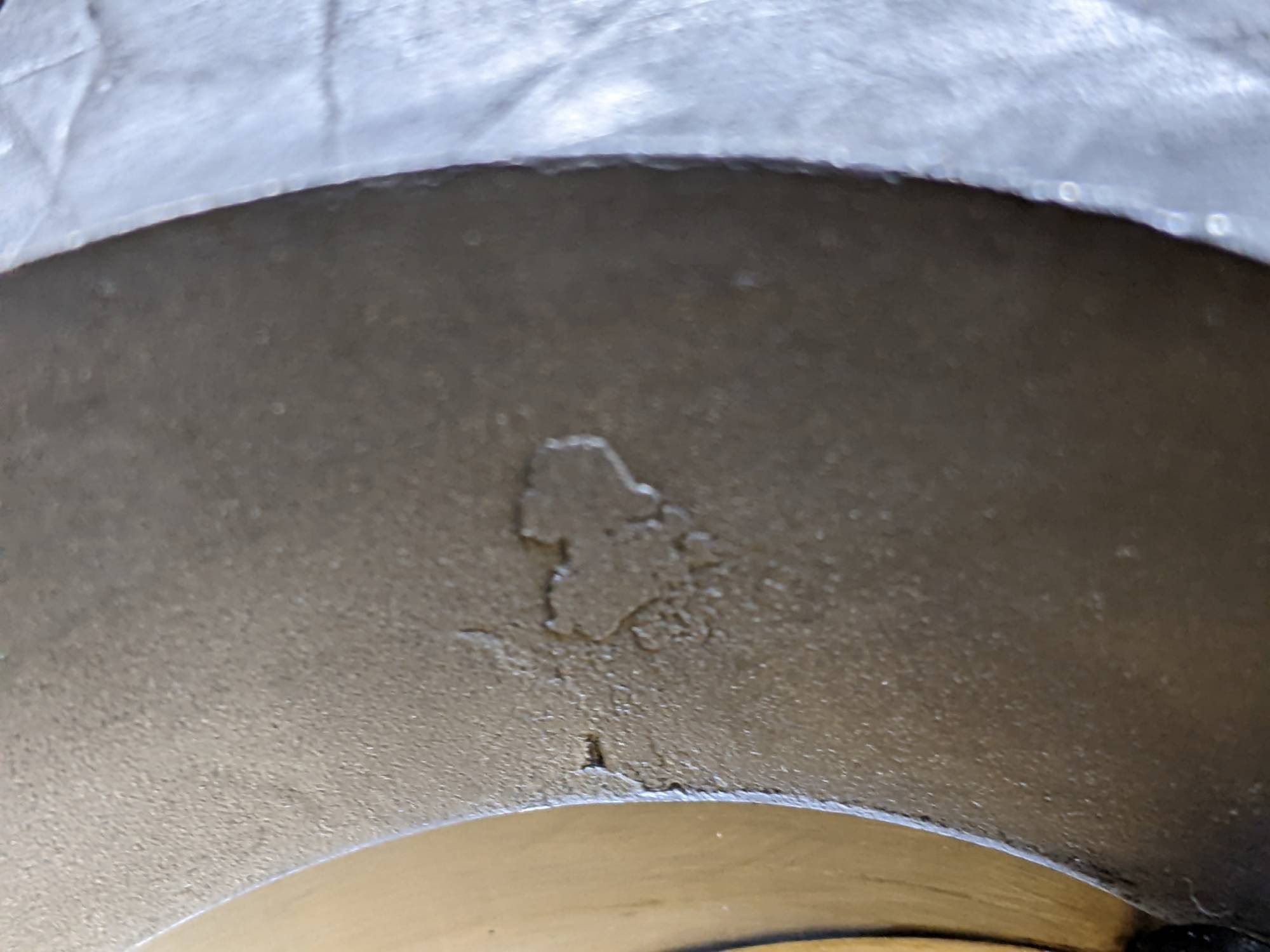 Surface flaws inside the throat of the body