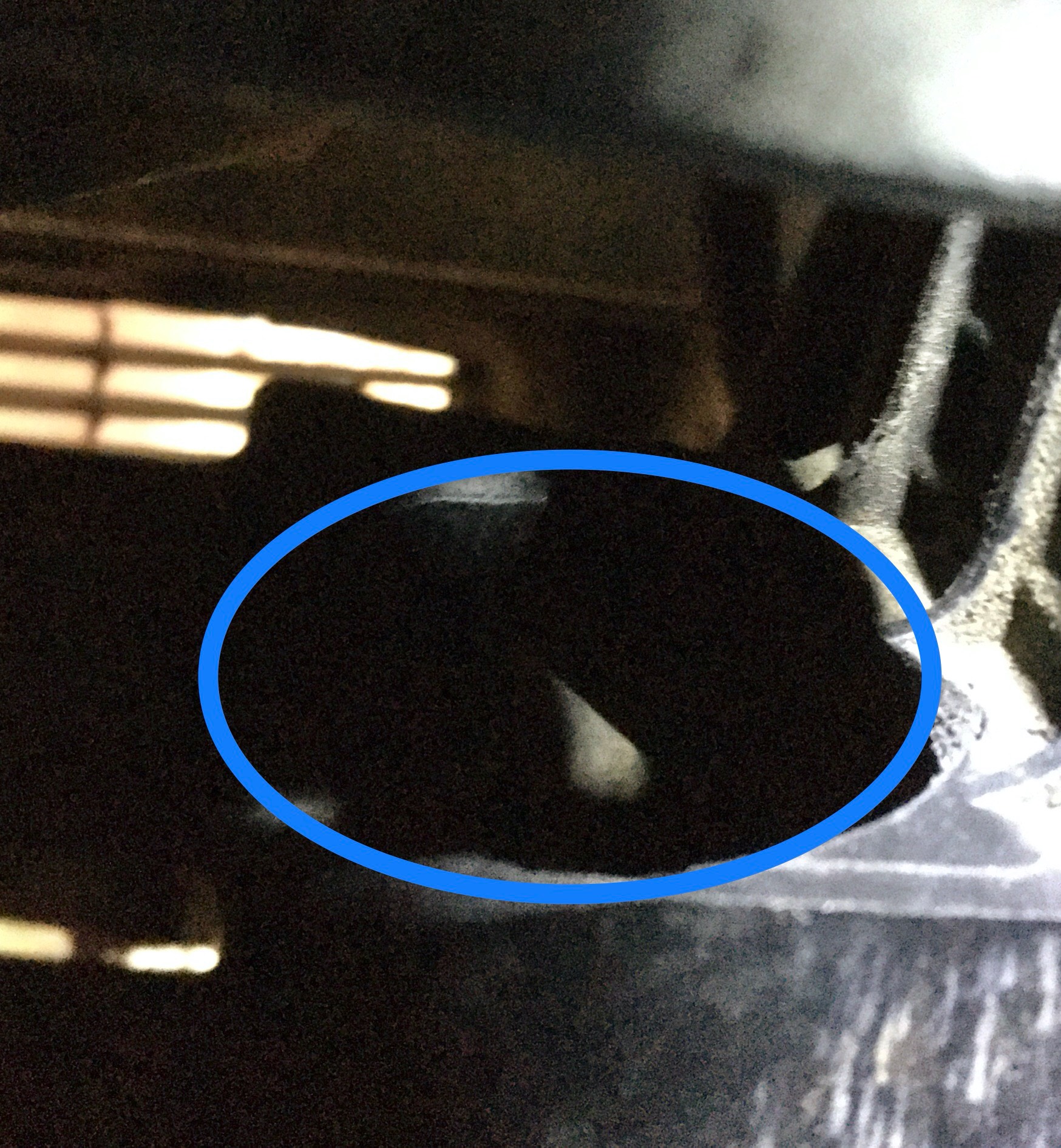 Should be plastic where the blue circle is