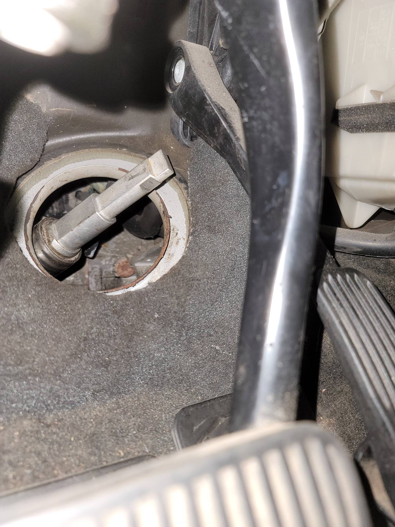 Steering yoke still "inside" the car.