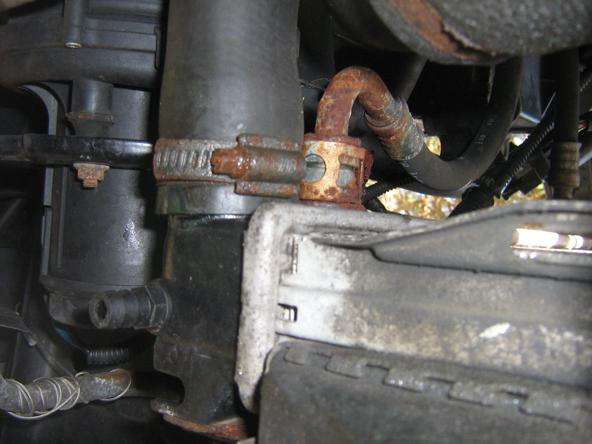 Trans cooler line connection at radiator - oil cooler line is on other side