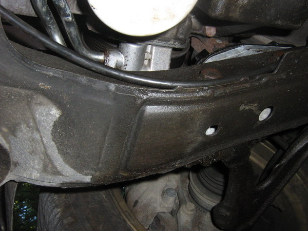 Wider shot of oil lines and thermostat