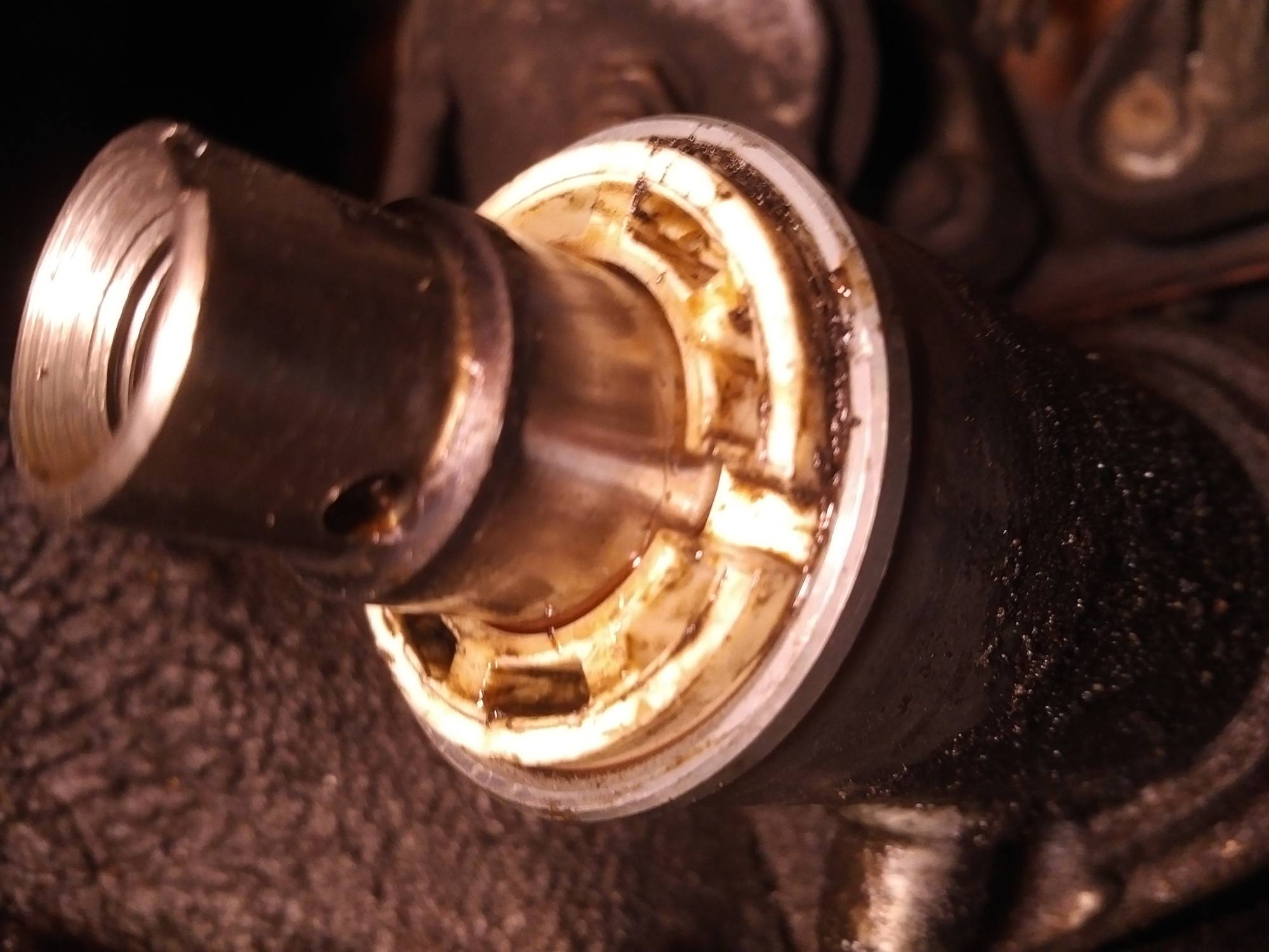Bushing in place, passenger side, steering gear.jpg