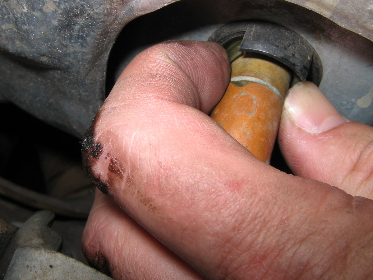 Squeeze lugs on connector ring.