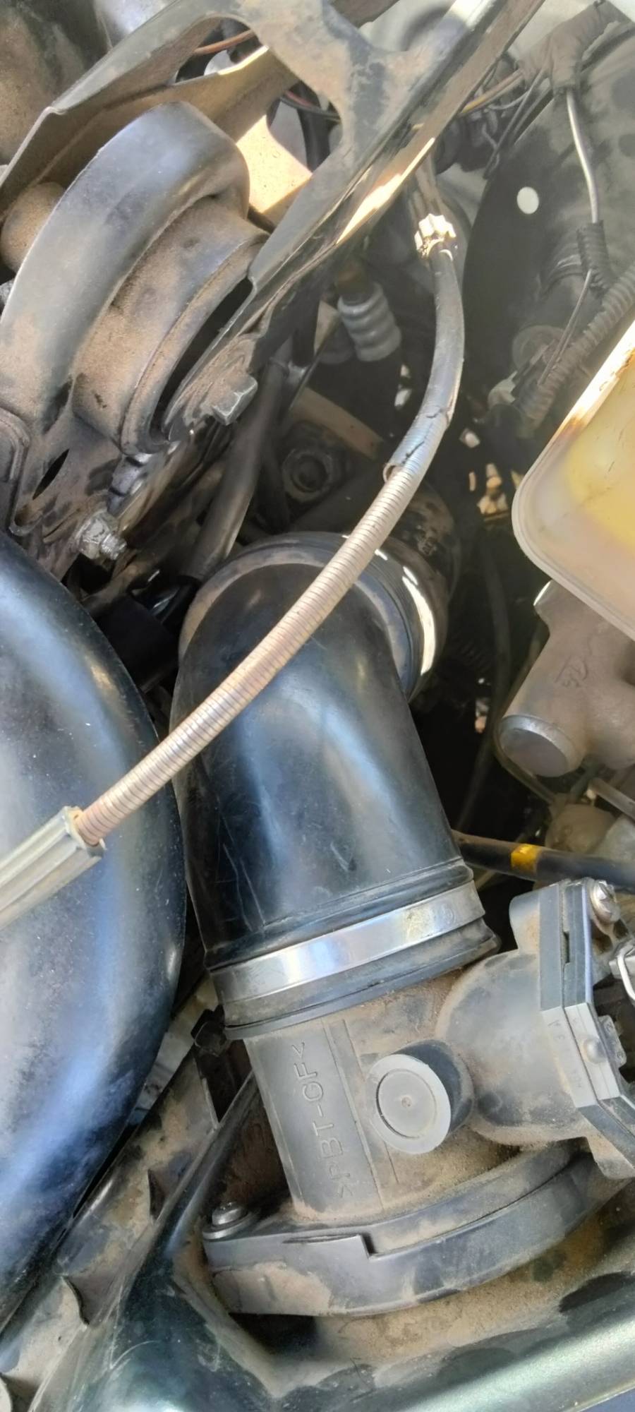 Top of air box( your right Scott it goes into the turbo.