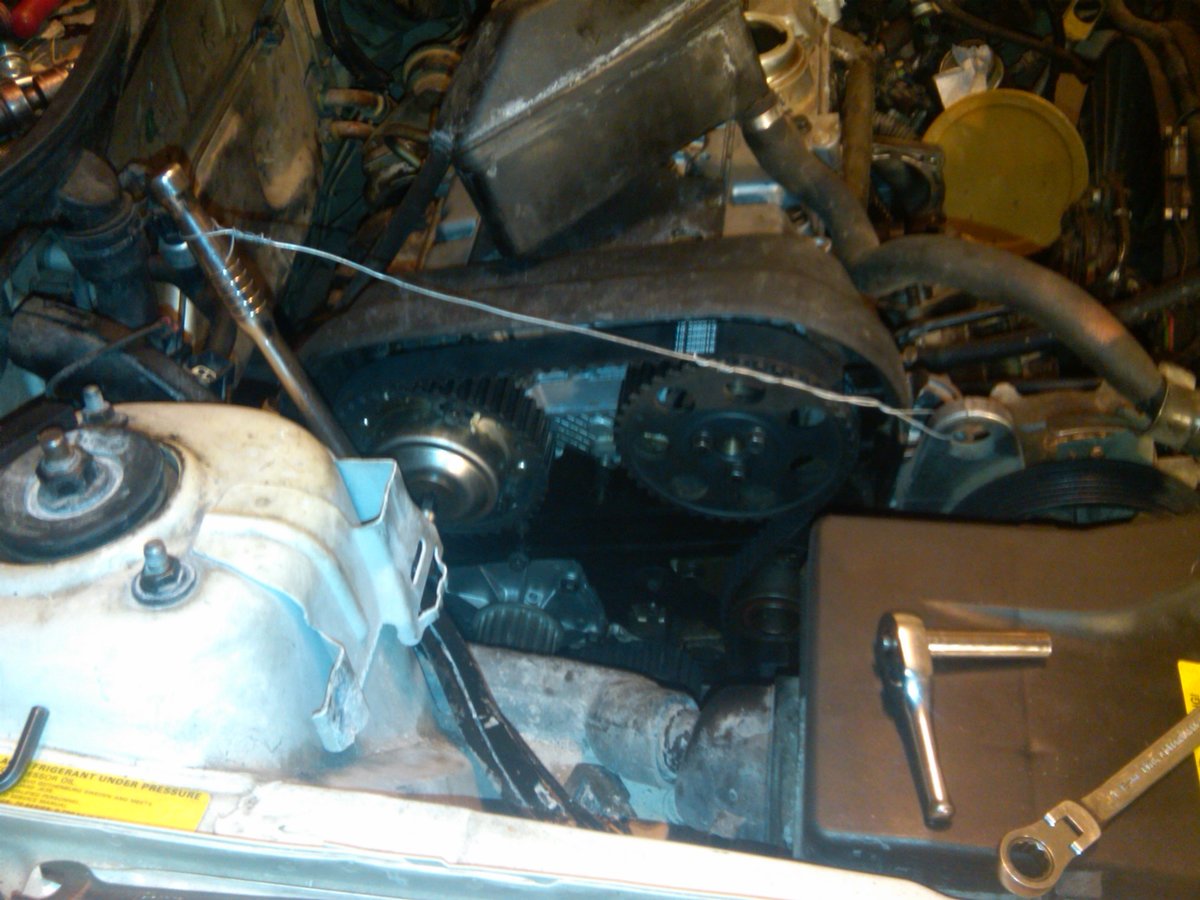 breaker bar with t55installed in the plug, not the bolt.