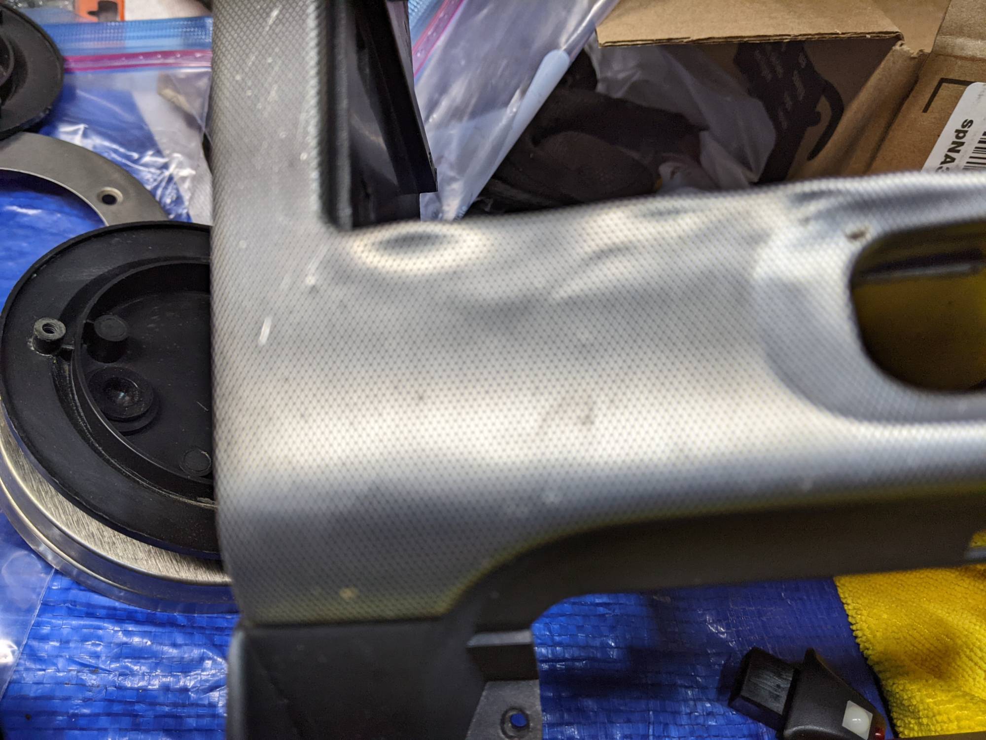 Dents in center dash covering