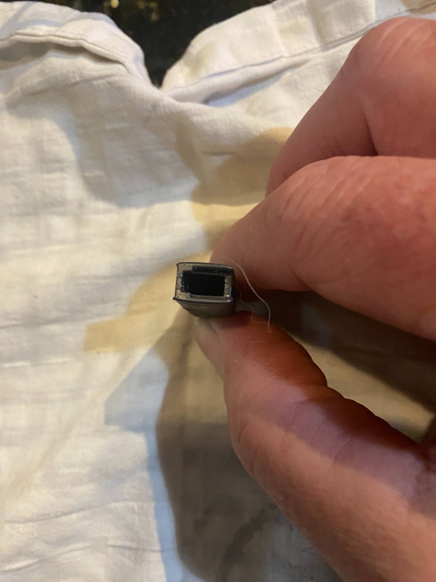 notched hole on bottom of shifter button.jpg