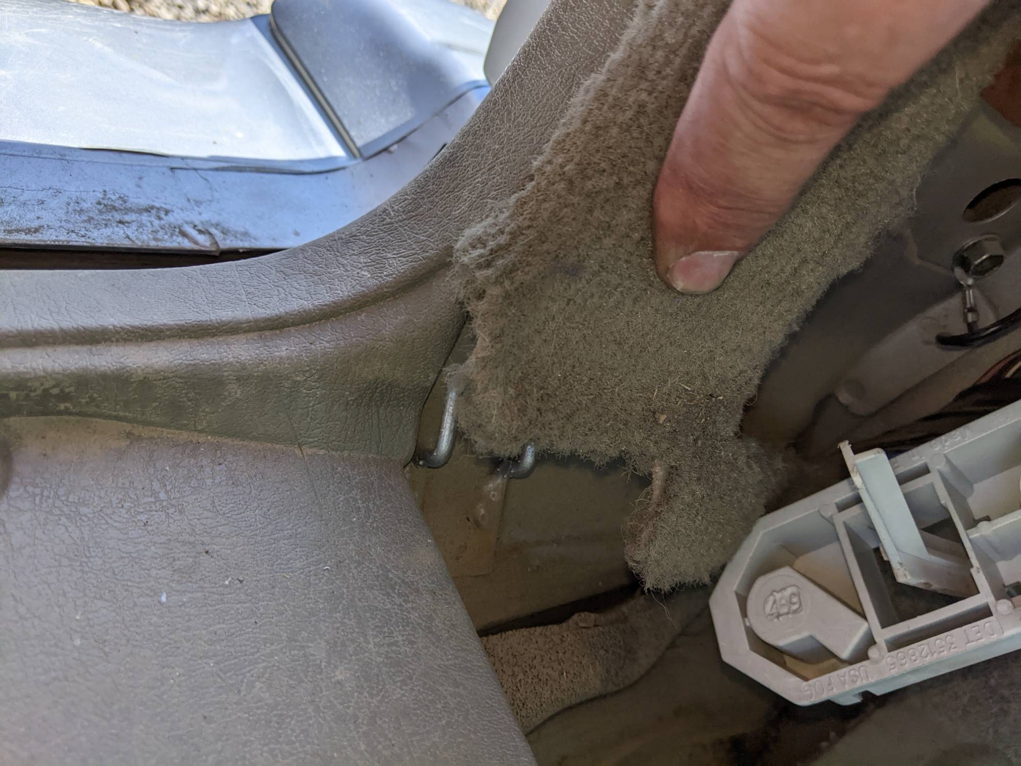 Lifting out the rear of the side panel