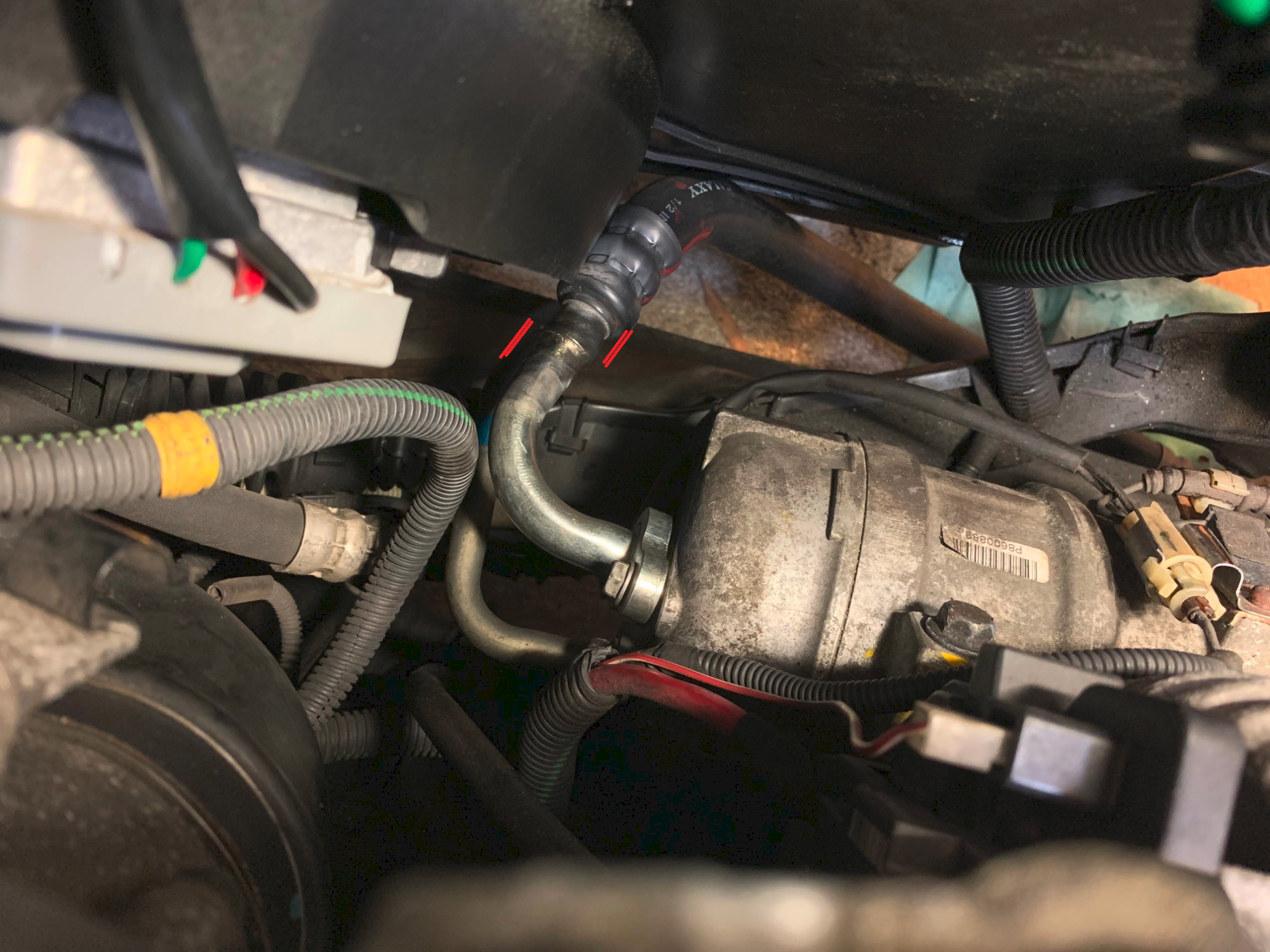 AC Suction Hose Elbow.png