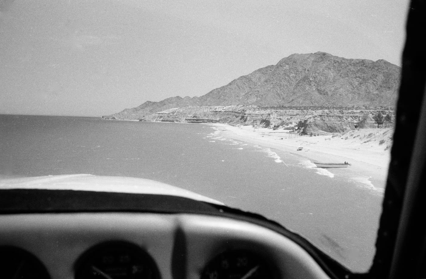 In this photo, Uncle Ray's house was exactly 90 degrees to our right, roughly 200m from the beach.