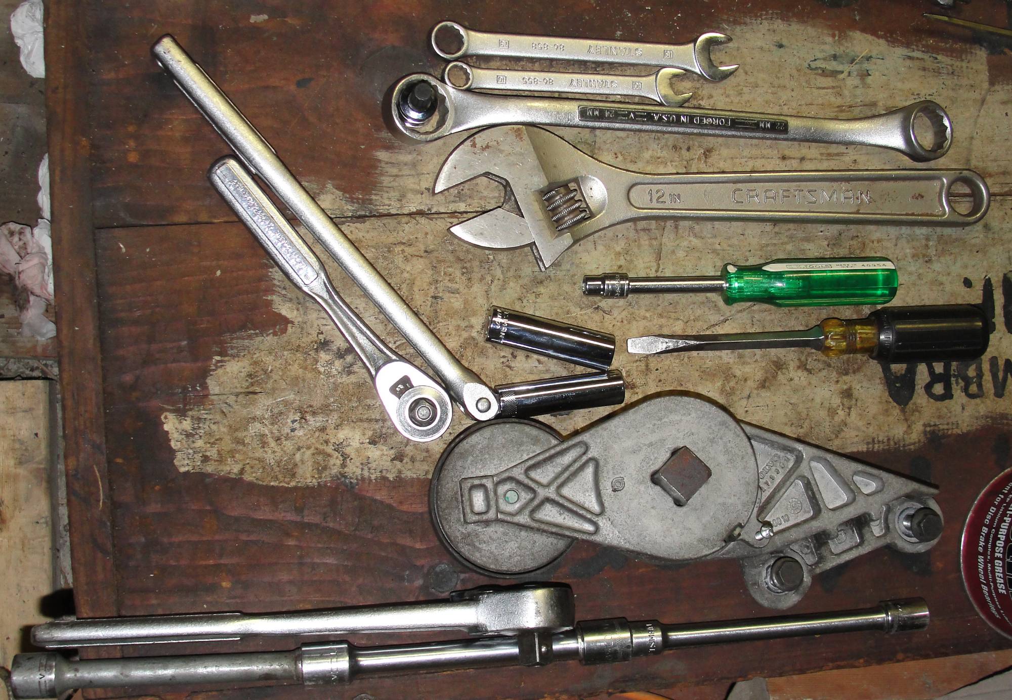 Tools used.  Note 19 mm steel in tensioner.  24 mm box and 10m tri-box spline are for alternator nut removal.  Impact is better.