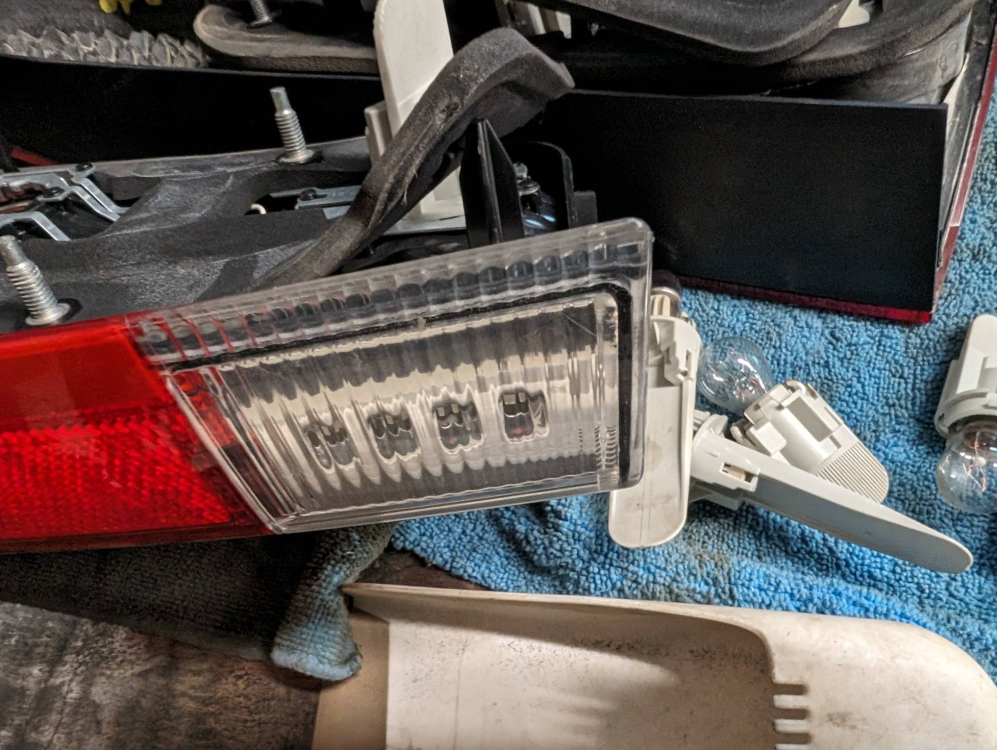 Marker light at side of rear lower taillight