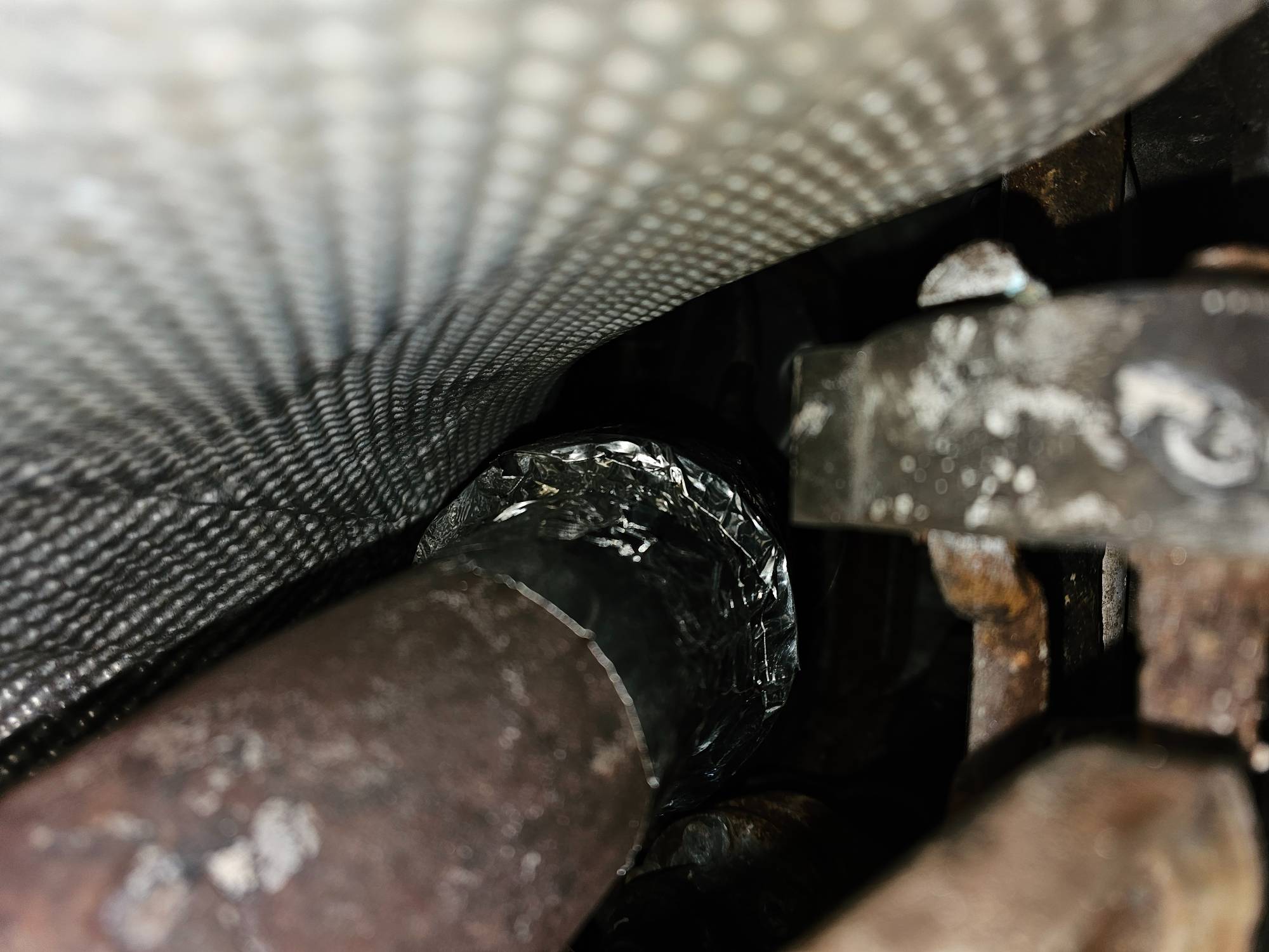 Wrapped with aluminum tape.