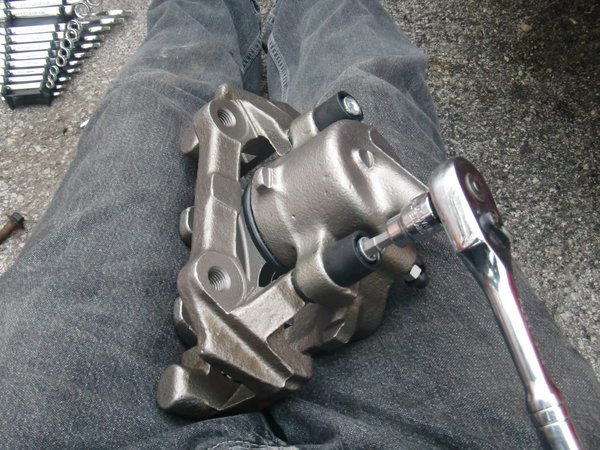 New caliper getting ready for it's new, larger bracket