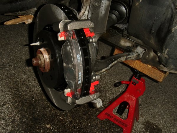 New outside pad laid into the lubed caliper bracket