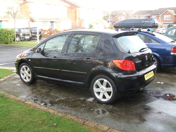 pug 307 180BHP fast but no good with three kids.owned for six months