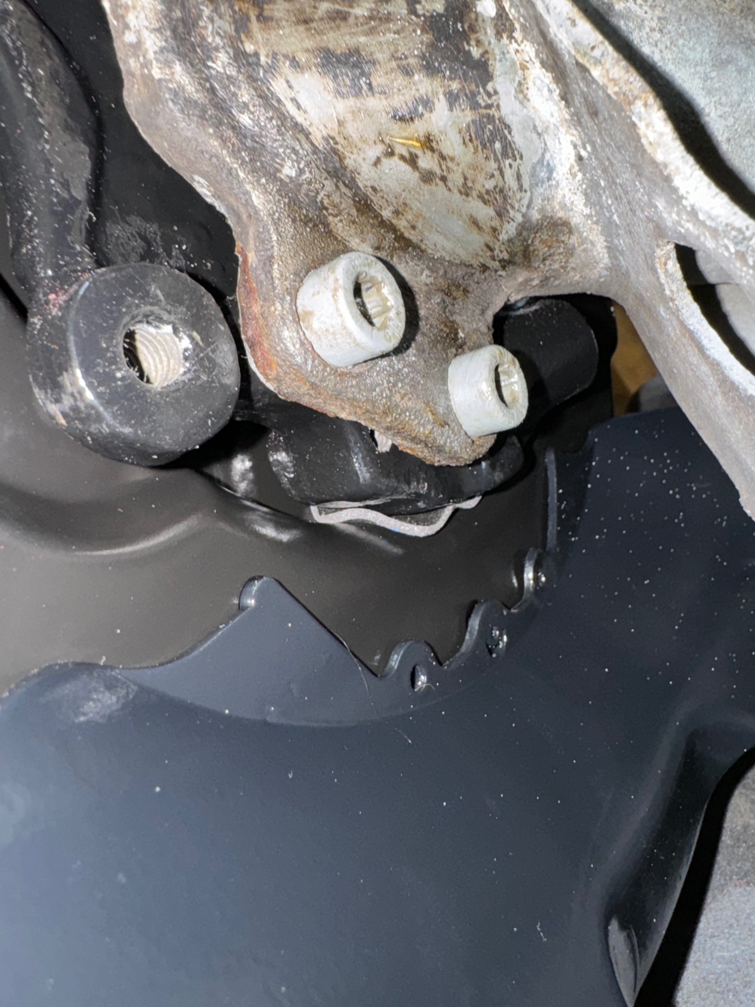 View of the backside of the dust shield, the modified gasket shape forms a better seal.