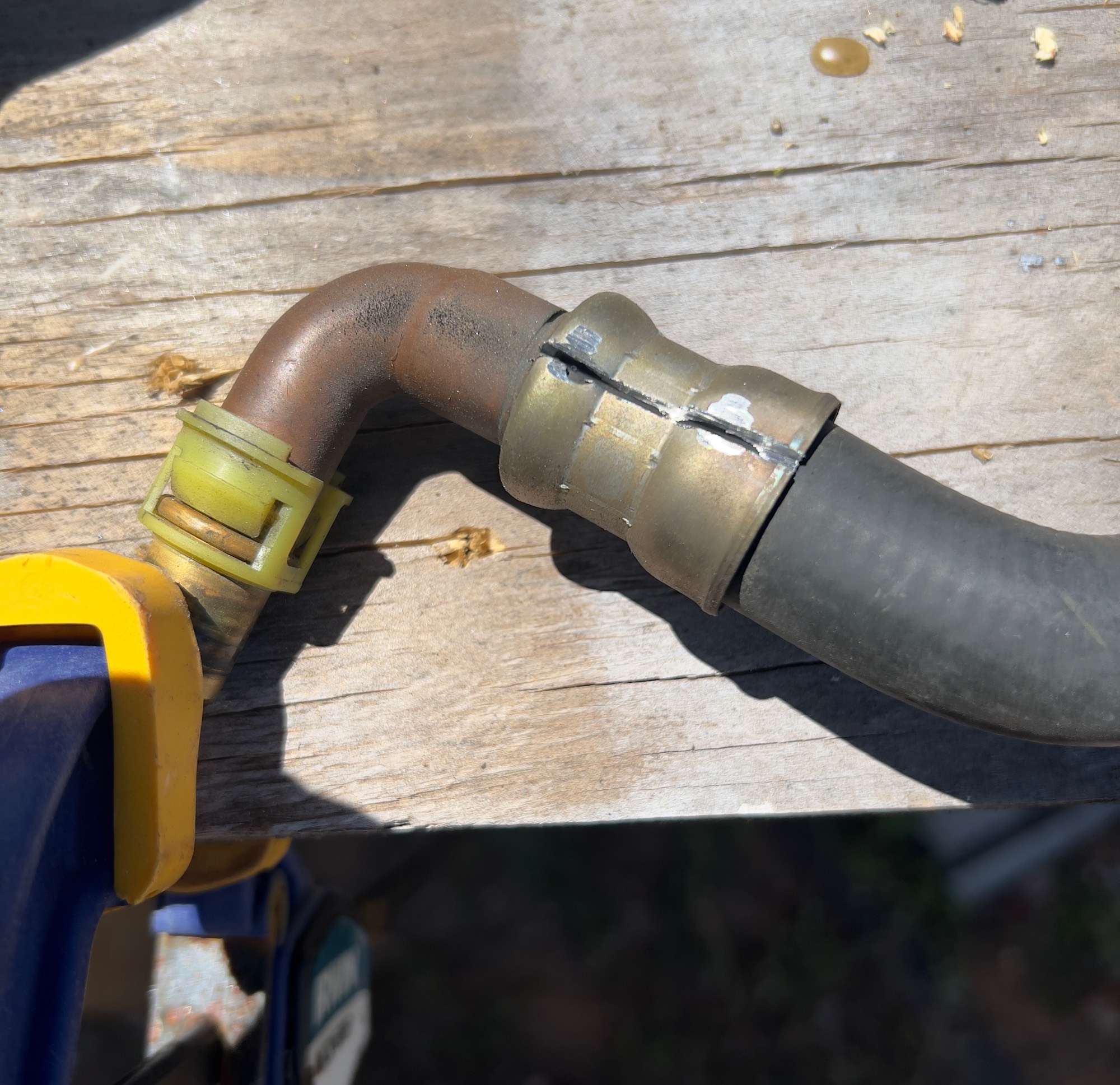 Hose clamped to work surface