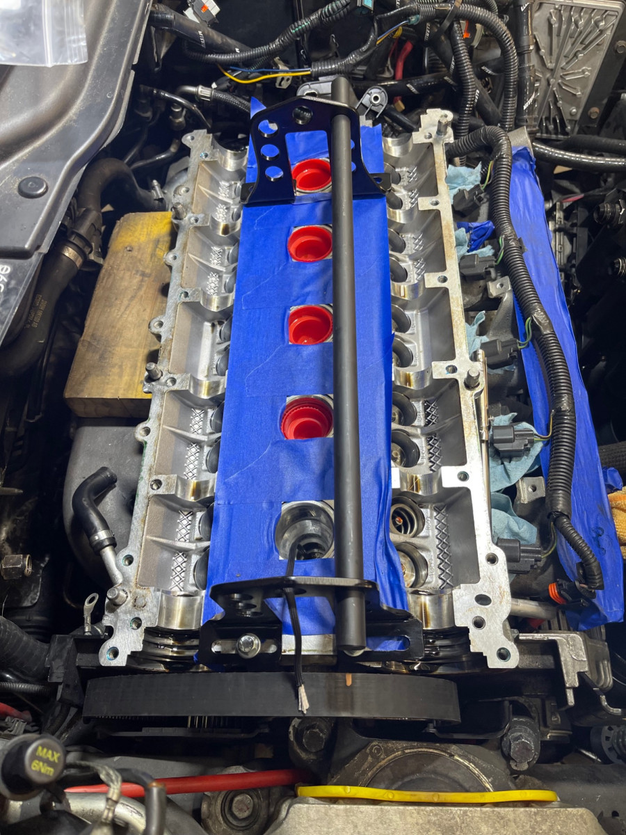 Prepare to remove the valve springs