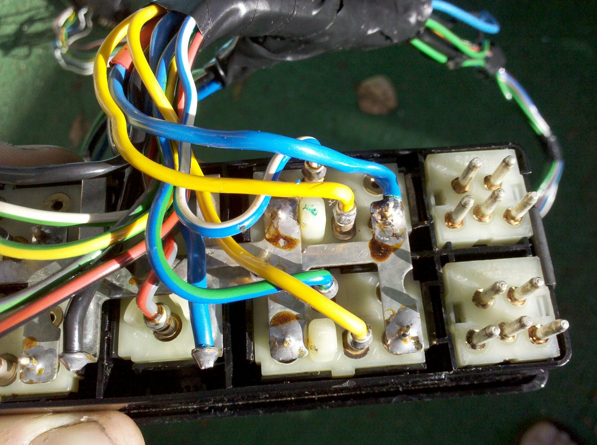 Note: The two yellow wires coming from the drivers and passengers switches on the down circuit.