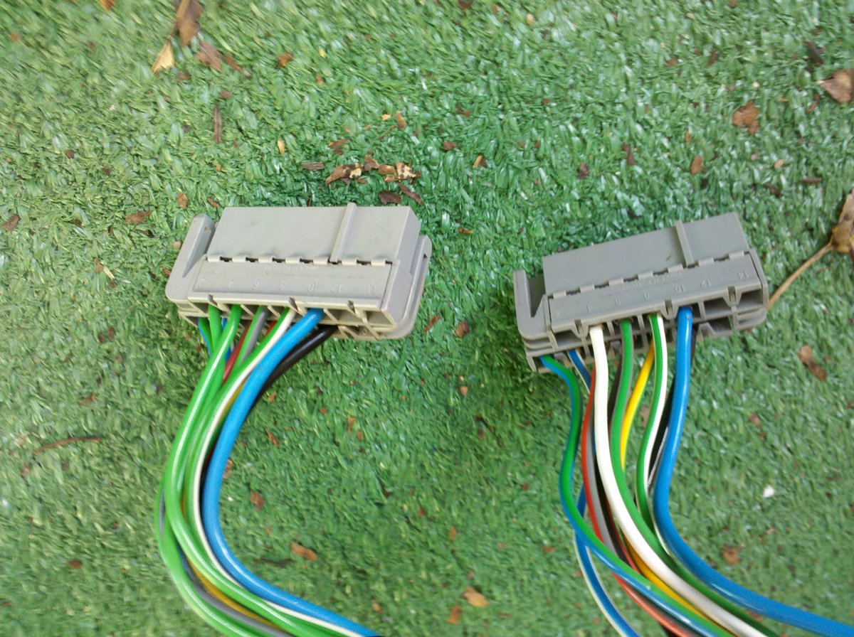 The connector on the right shows where the white wire used to be(pin 4). The left shows both green wires (pins 2 and 4), the new dual relay setup.