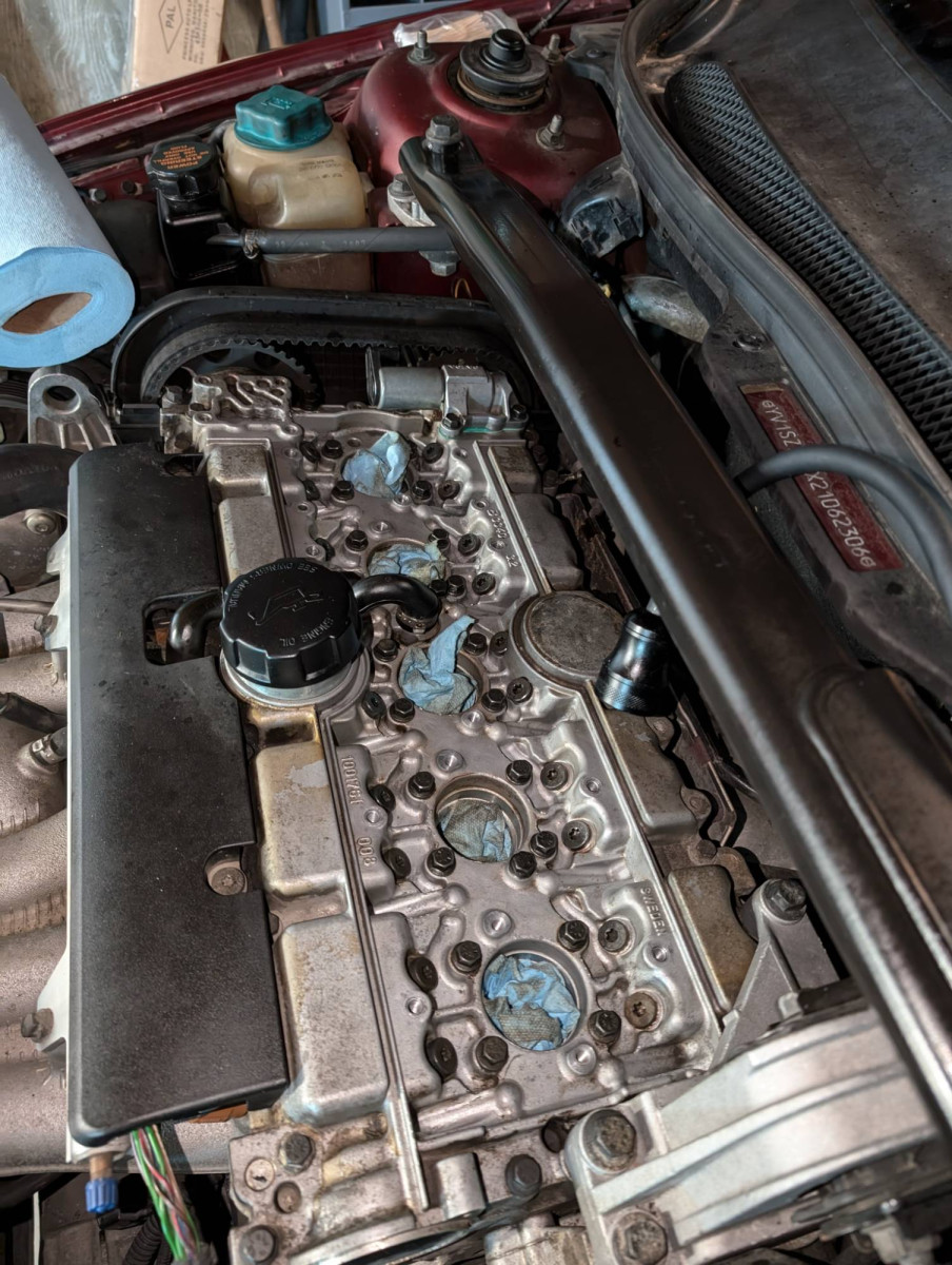 Oil cleaned off the top of the engine