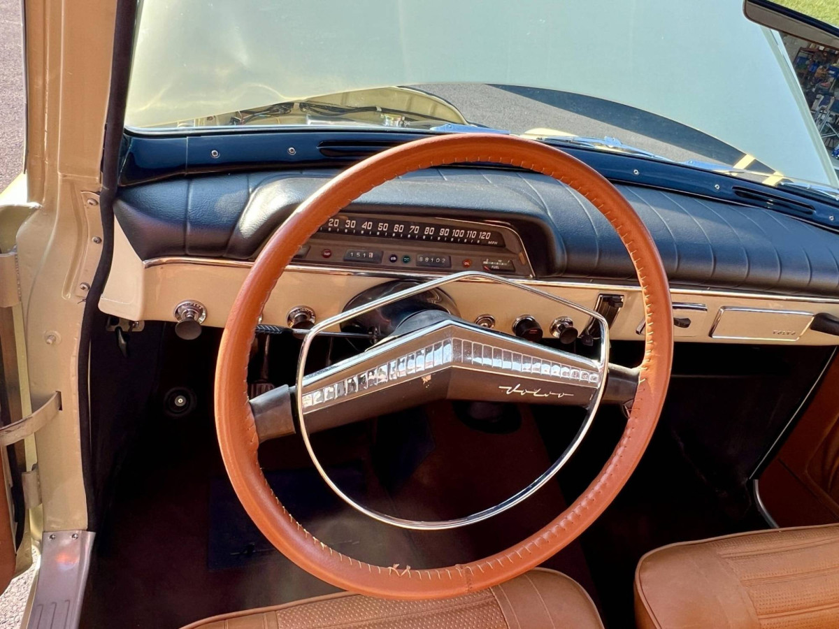 1965_volvo_122s_radio delete plate.jpg