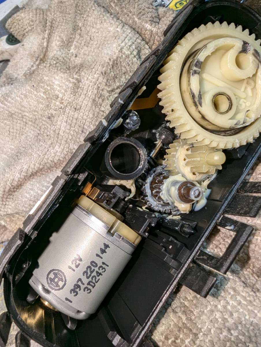 Inside the headlight wiper motor unit