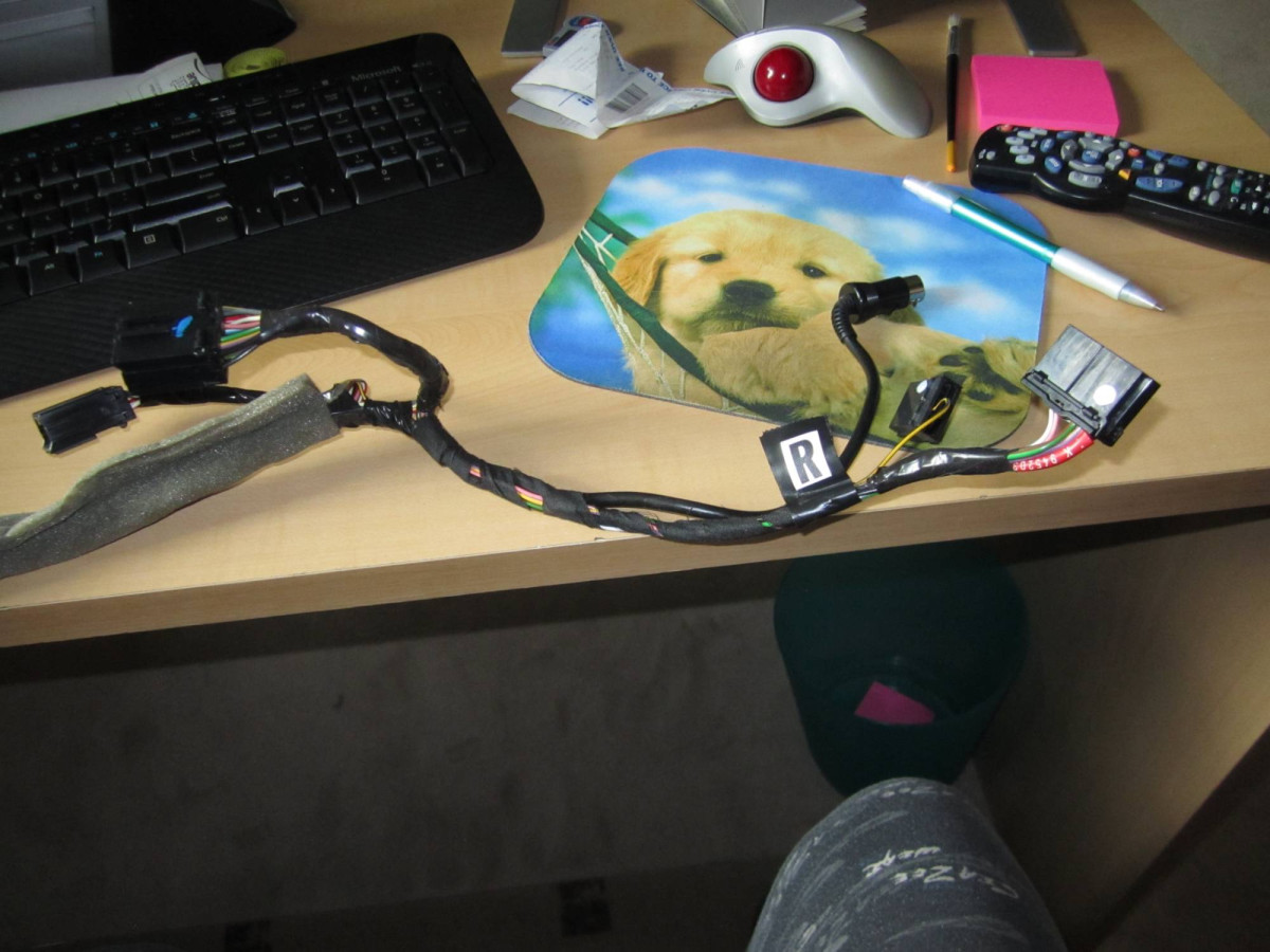 Connector harness from standard radio harness to amp