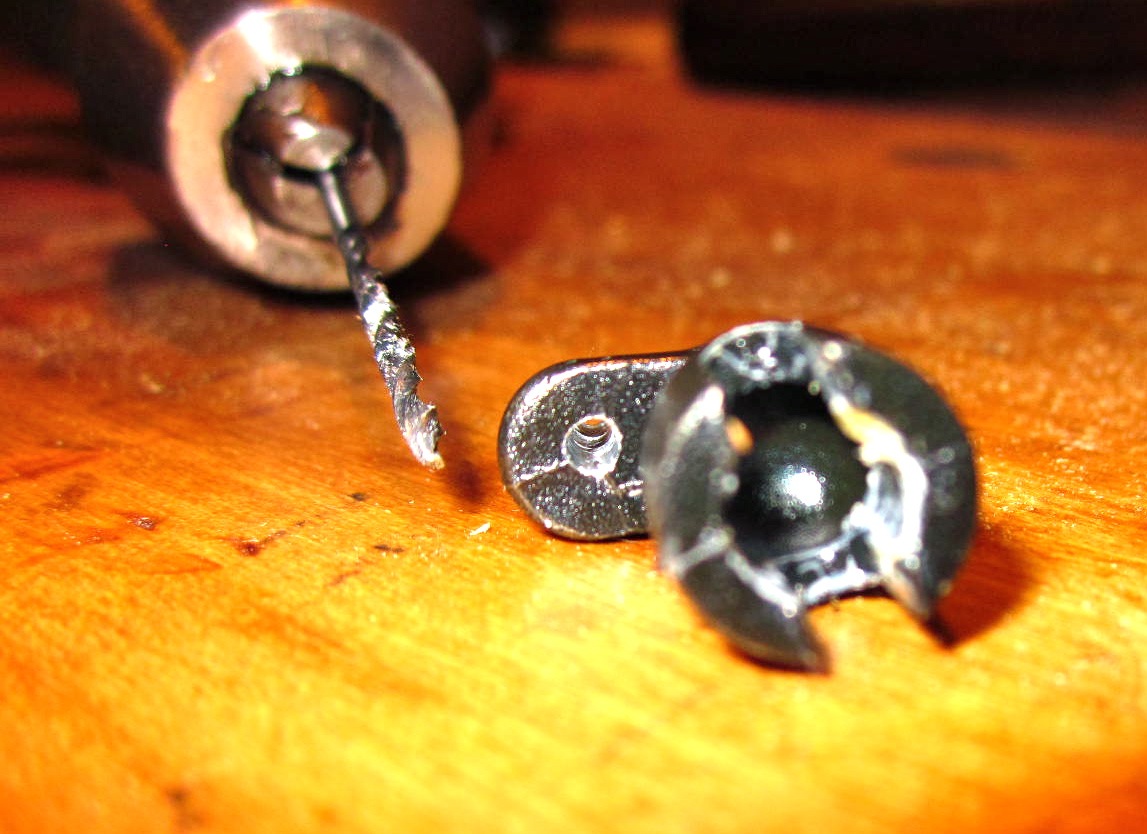 End view of actuator with the freshly drilled hole made with a 1/16" bit and hand drill.