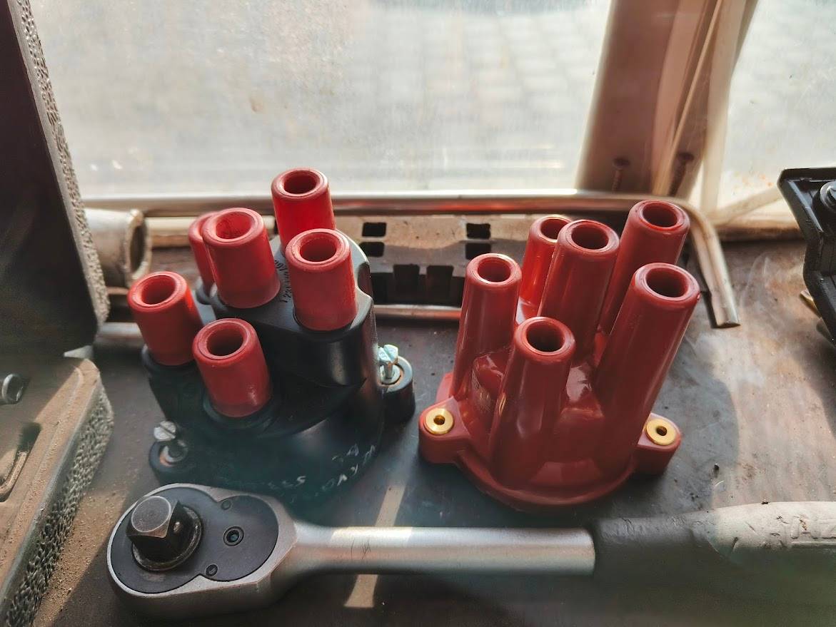 old and new distributor cap