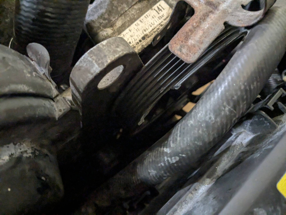 Tried to pry on the PS pump pulley and cracked off the shoulder.  Oof!