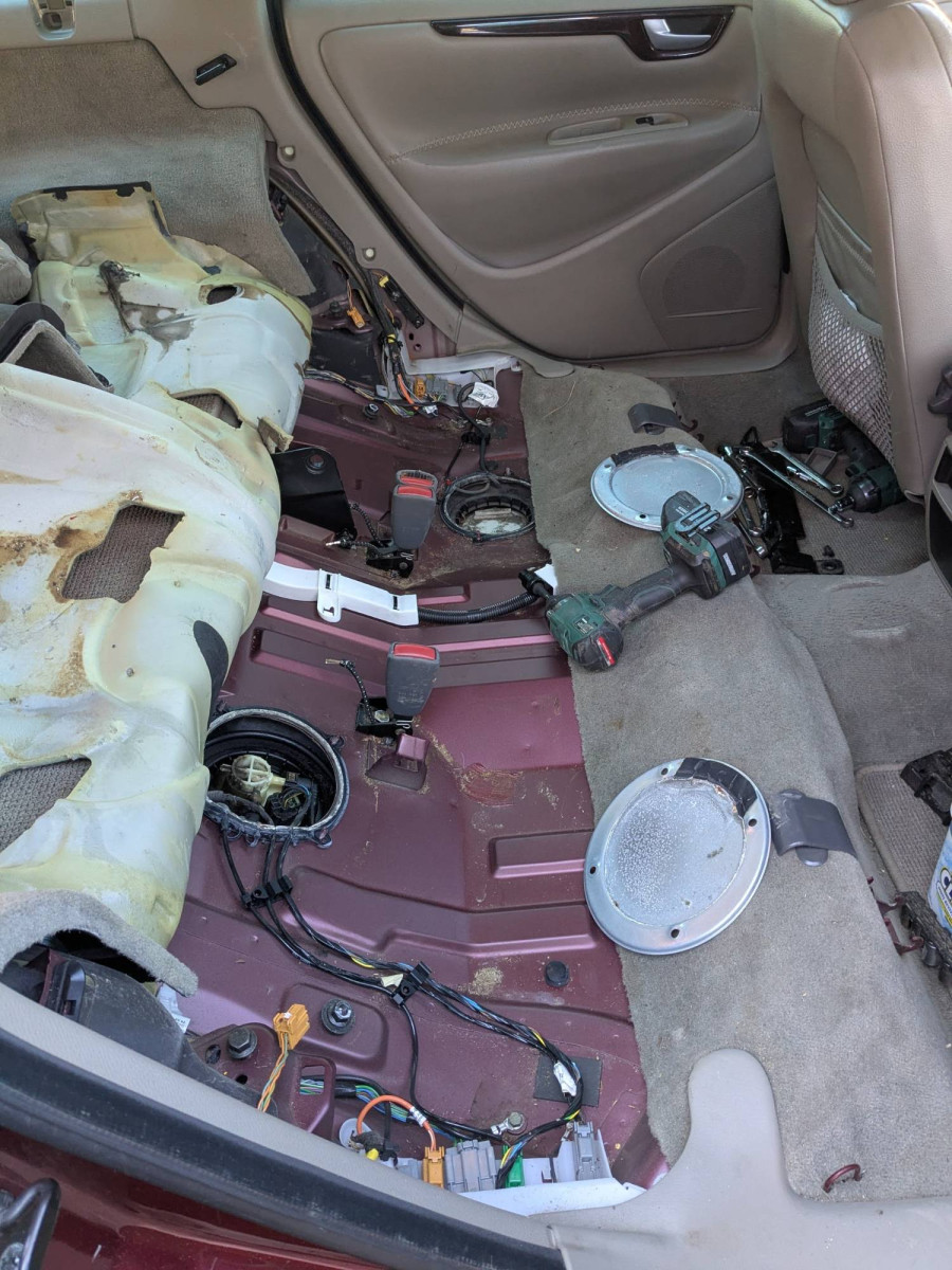 Back seat removed, both access holes visible.