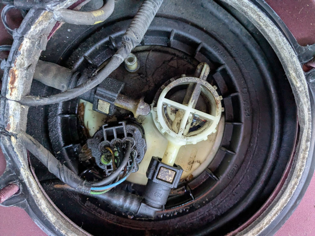 Car running, + reservoir slowing filling with fuel.