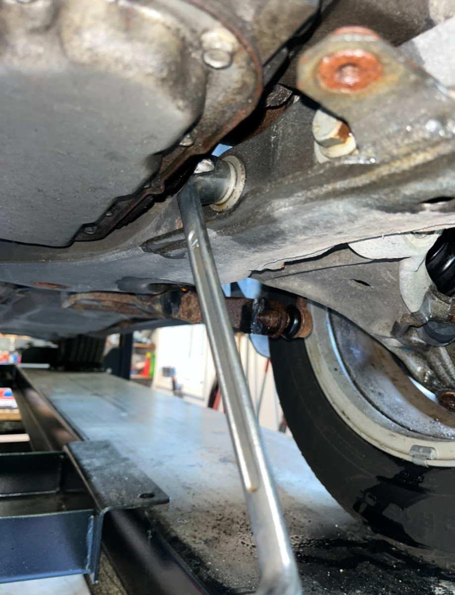 Driver side control arm front bushing bolts