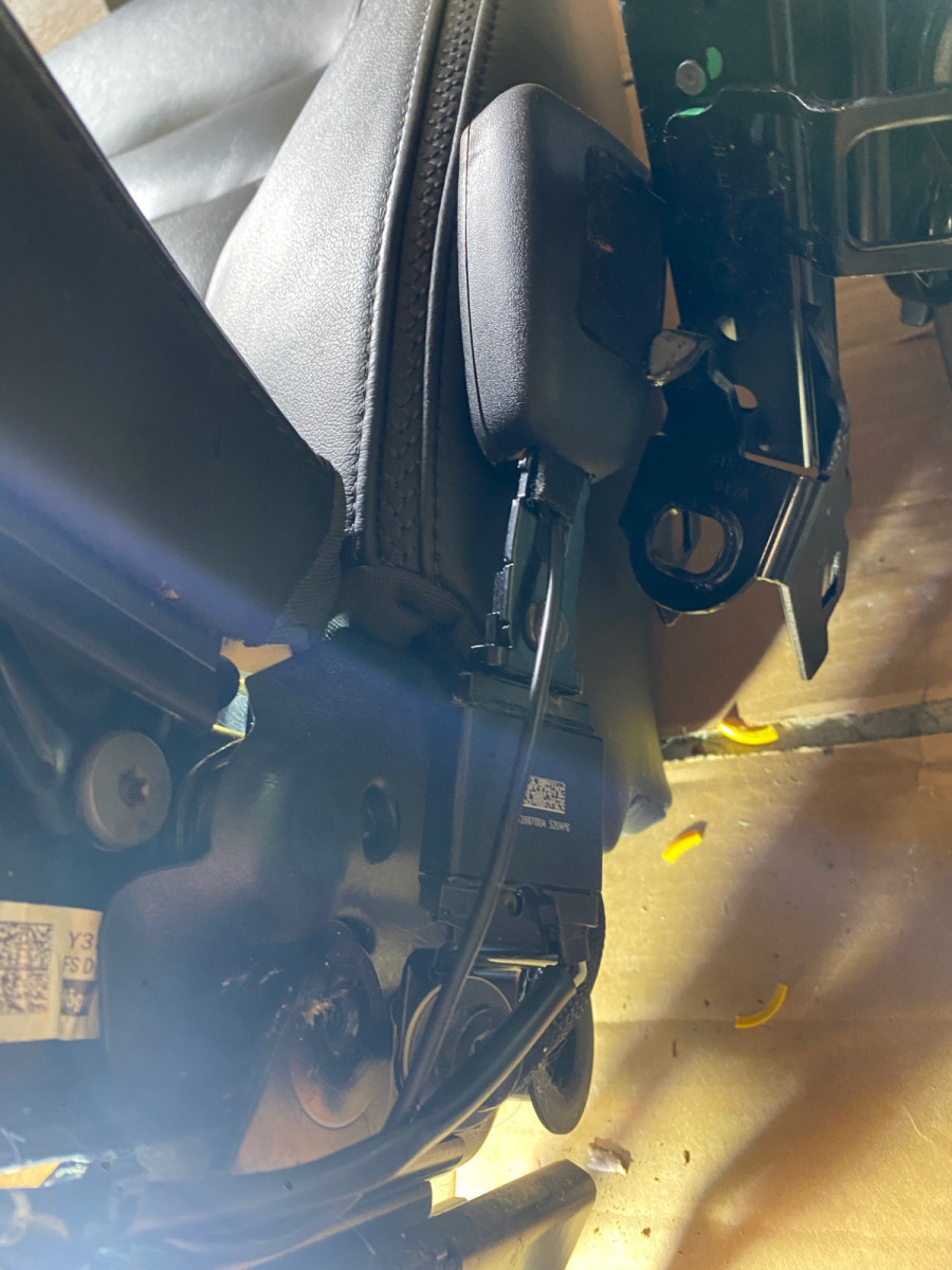 2016 seat belt module: 2008 module on seat belt buckle connected to car/seat frame