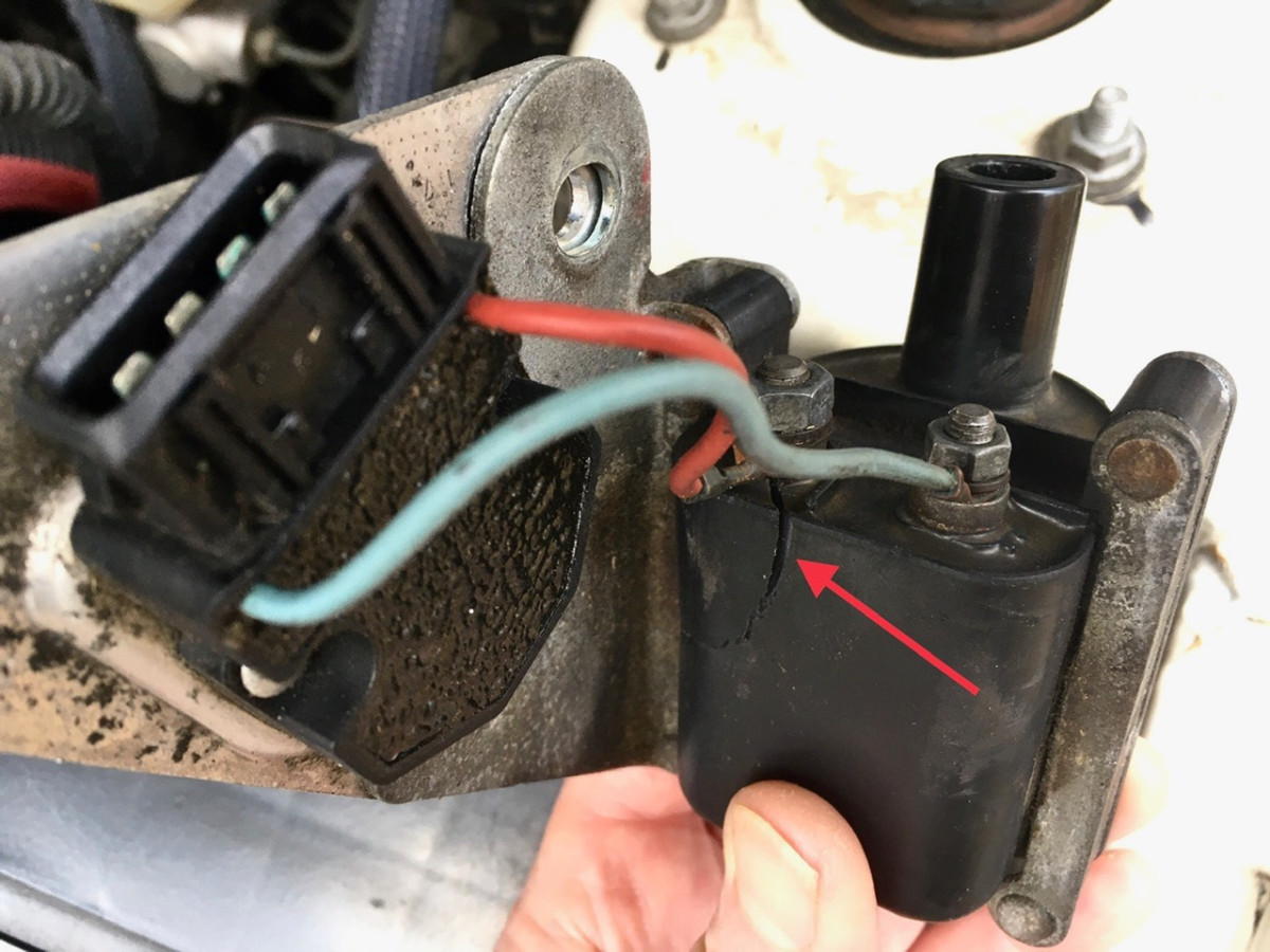 Cracked case around positive coil terminal