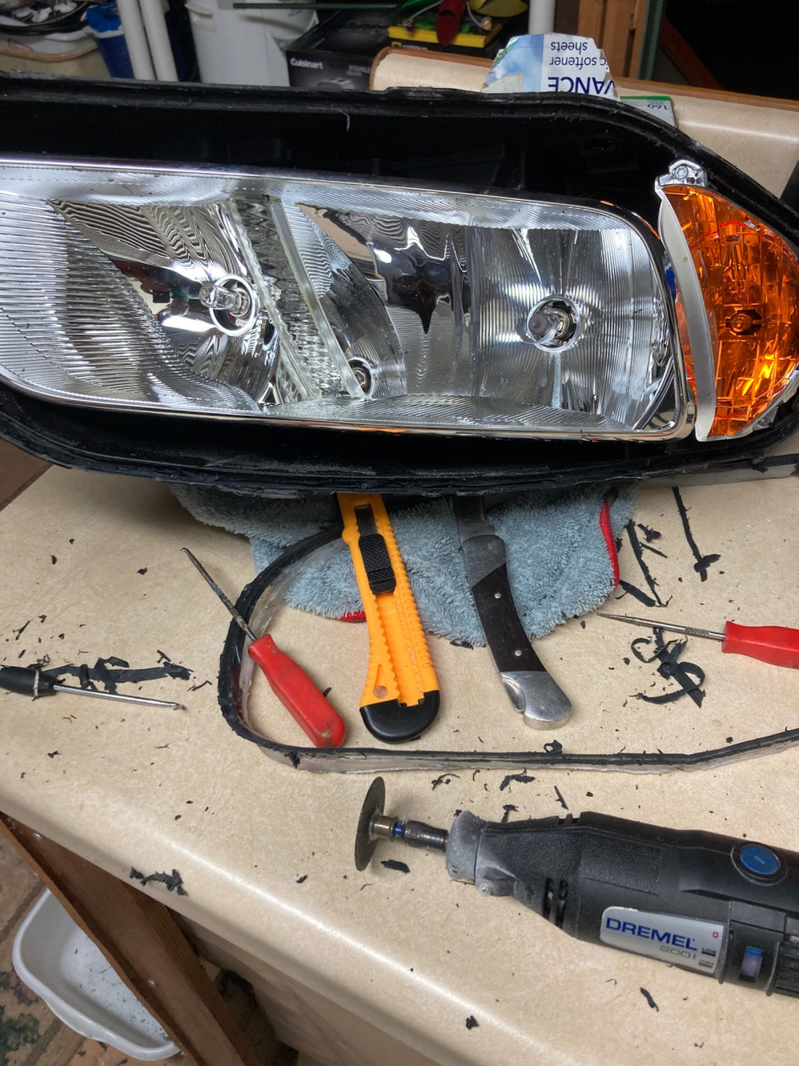 tools and lens plastic strip removed