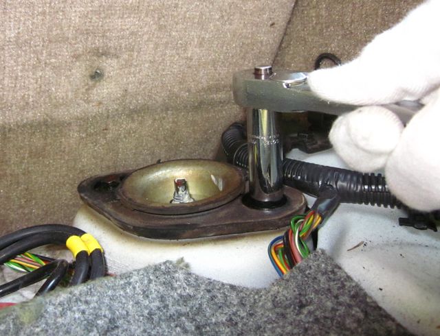 *Picture of wrench on rear mount bolt