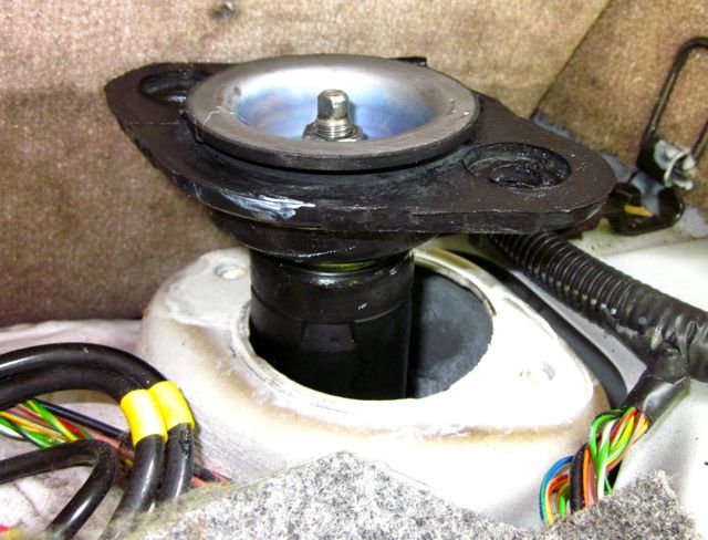 New shock and mount as seen from inside the wagon, before attaching the mount to car body