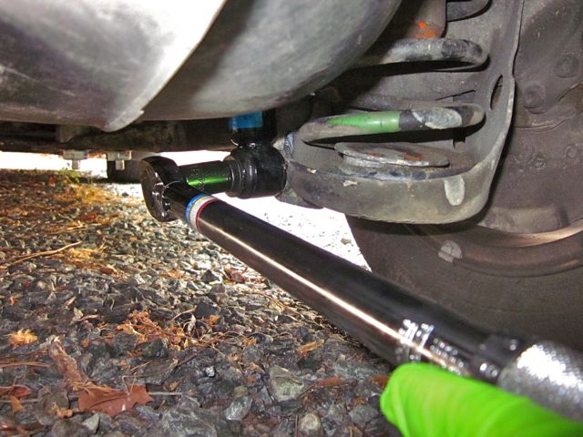 Torquing the lower nut to 59 ft-lbs.