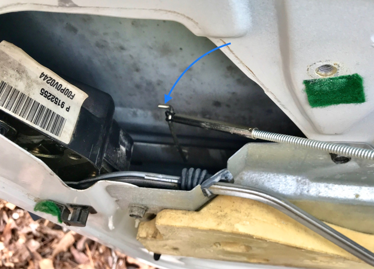 Grabbing the fallen rod and pulling it up and out