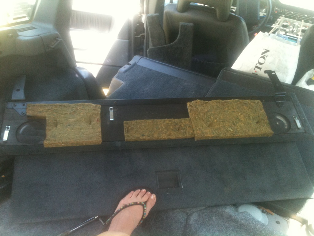 Picture of the 3 retention brackets on rear decking; shiny items in picture