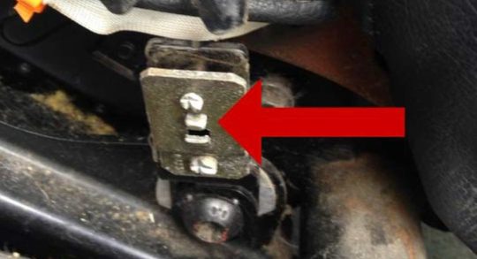 seatbelt release tab