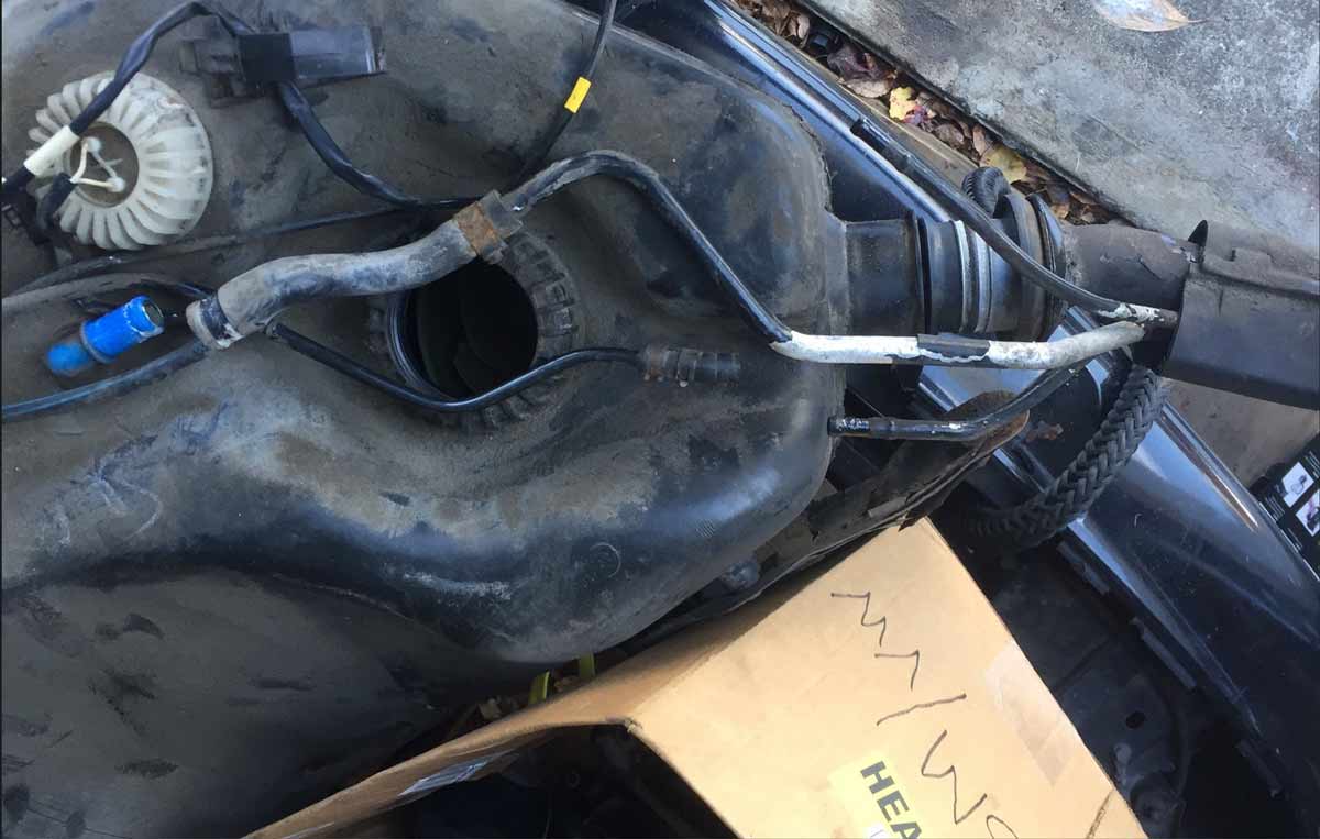 How to drop fuel tank - it's out and disconnected